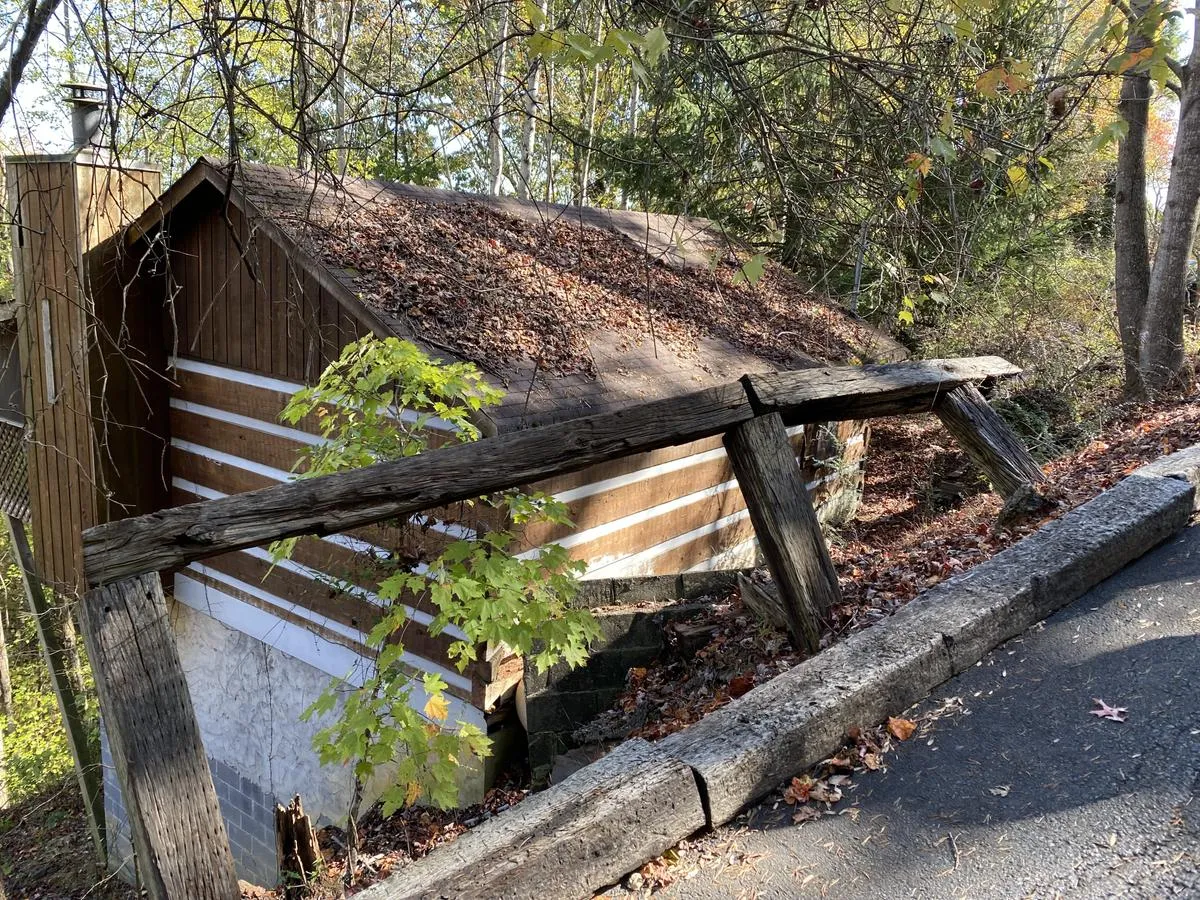 1768 Ridgecrest Dr before — An Out-of-State Owner Dealing with Loss